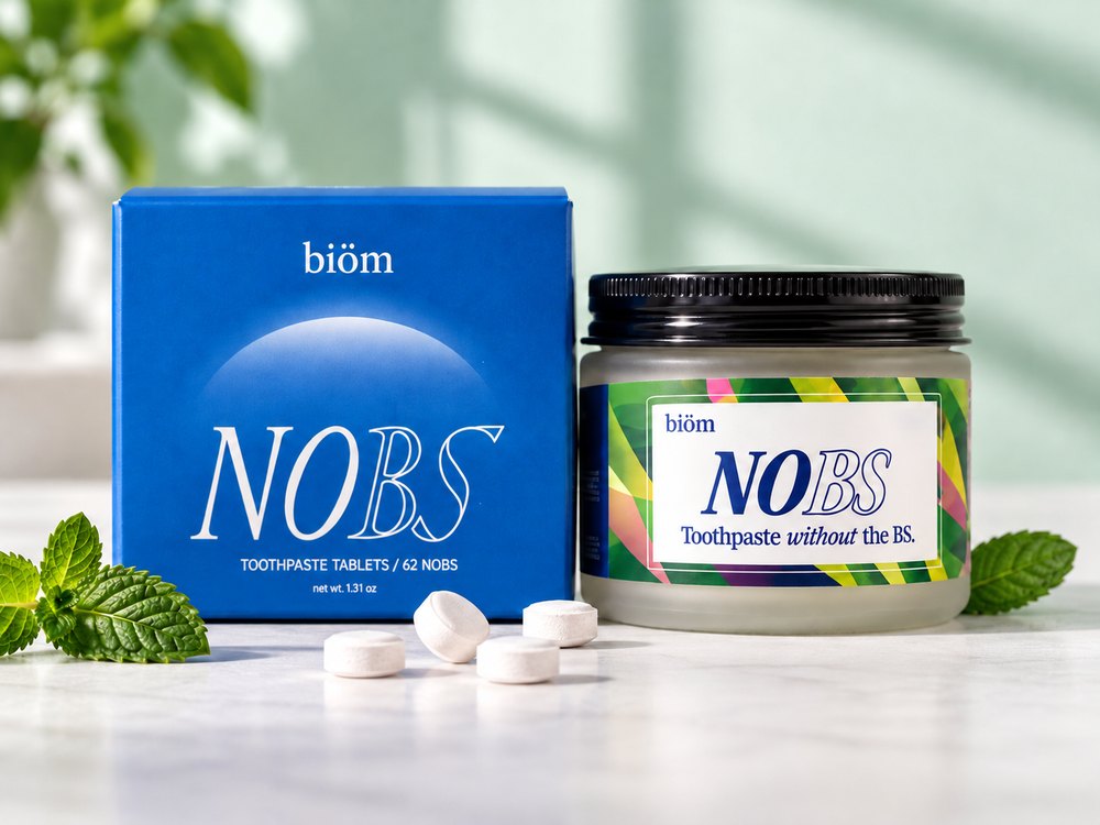 NOBS frosted jar and blue carton with toothpaste tablets
